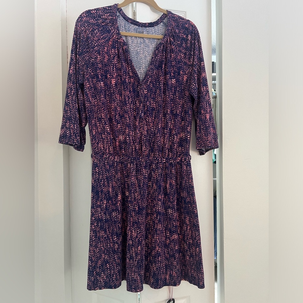 Ana dress with elastic waist and wristbands. Runs a little short.